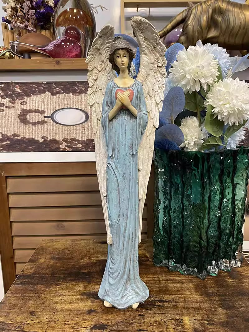 Heart-Holding Angel Statue – Symbol of Care & Gentle Presence