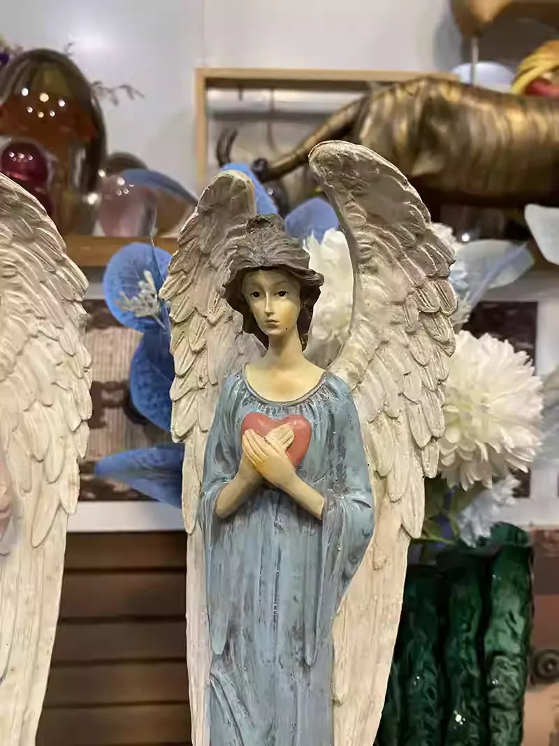 Heart-Holding Angel Statue – Symbol of Care & Gentle Presence