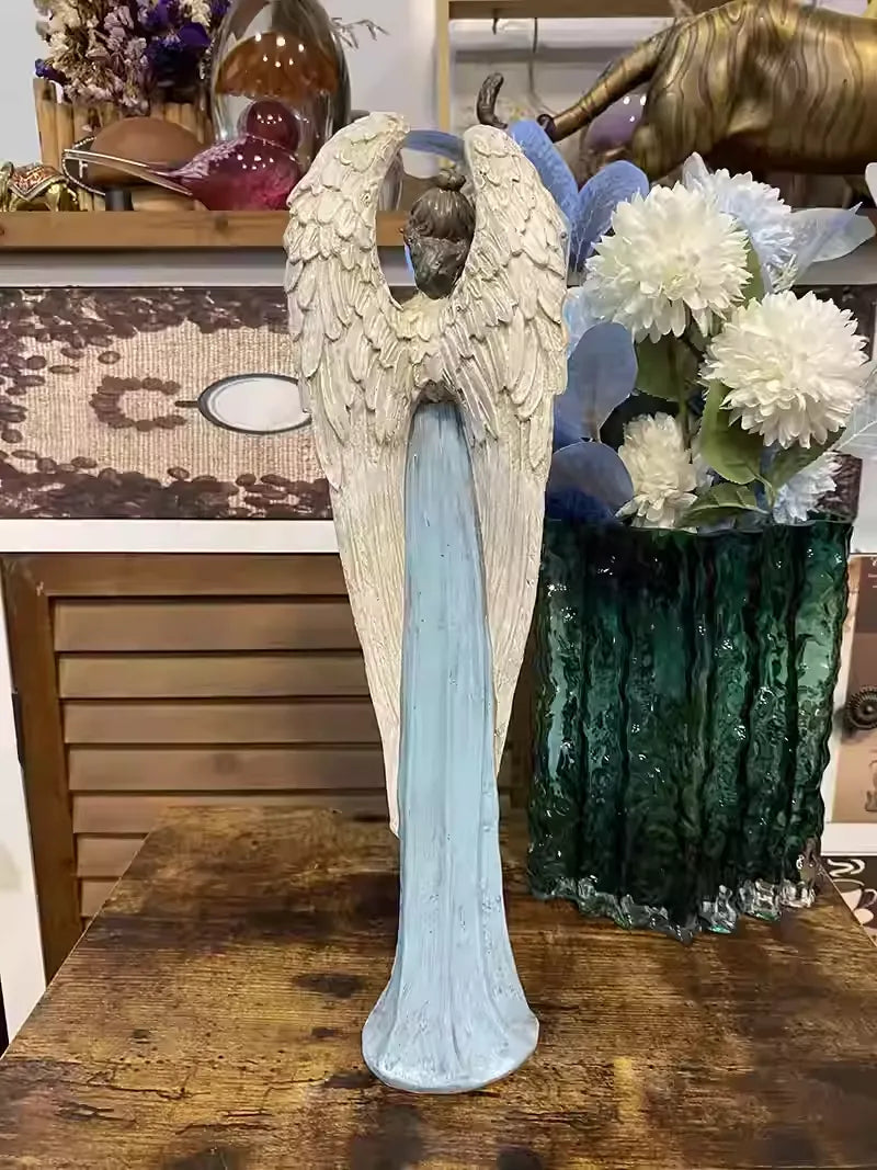 Heart-Holding Angel Statue – Symbol of Care & Gentle Presence